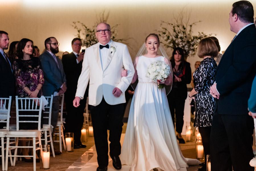 Father of the bride walks bride down the aisle