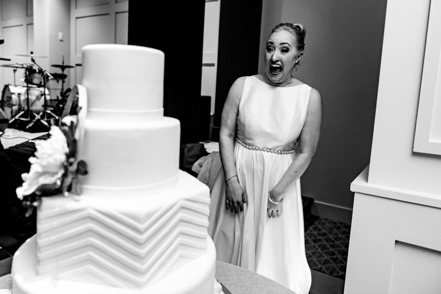 Bride reacts to surprise of puppy replica hidden in her wedding cake