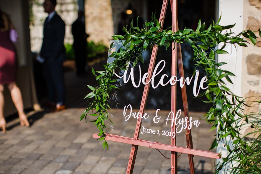 welcome sign at wedding reception