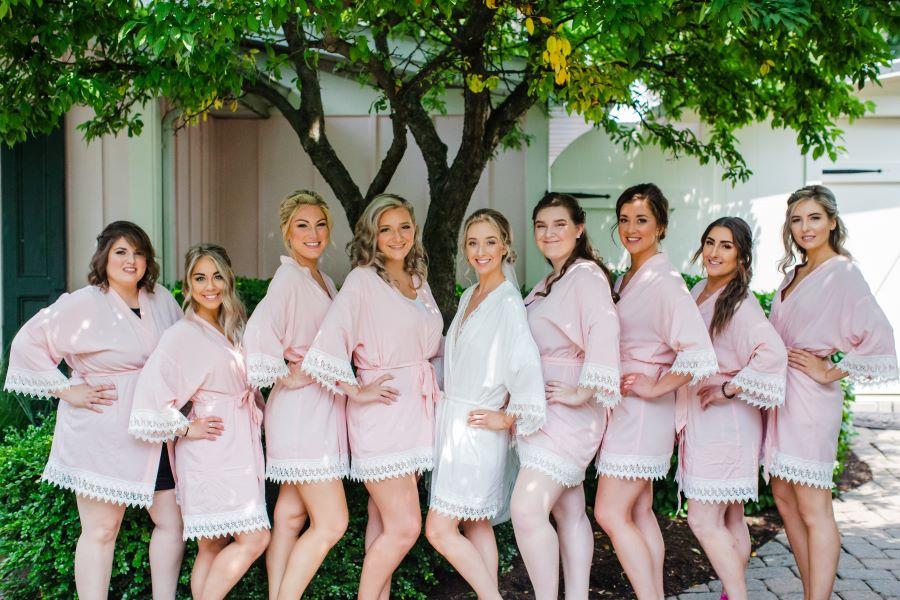 bride and bridal party wearing short robes