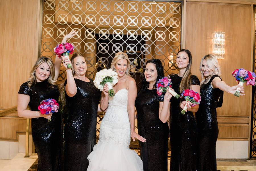 bride and bridesmaids holding bouquets