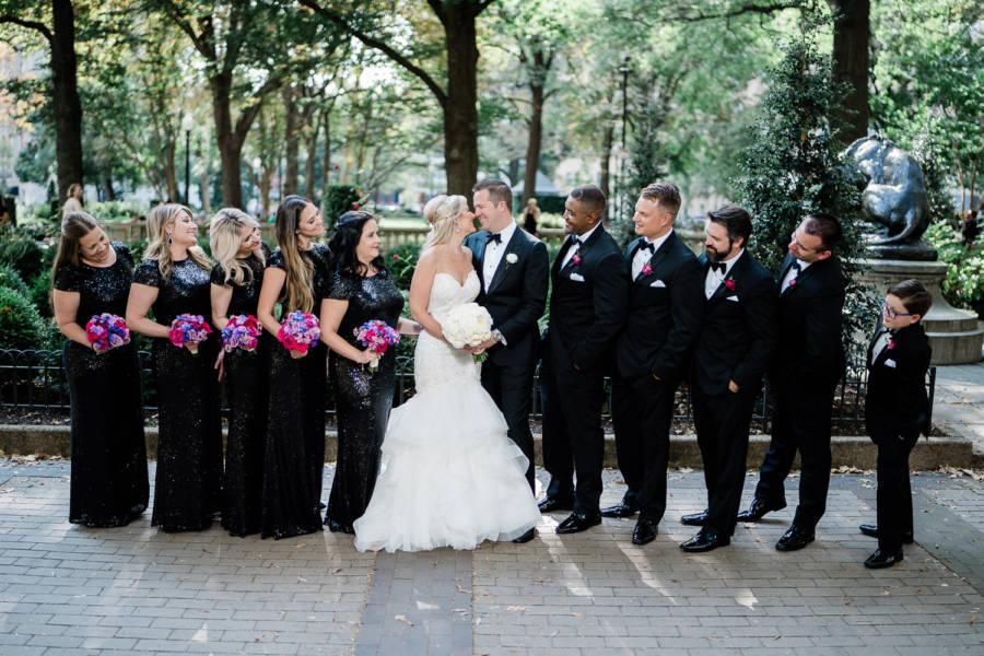 bride and groom with bridal party by j & j photography studios