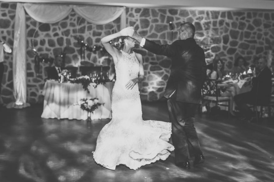 bride dances with father at wedding