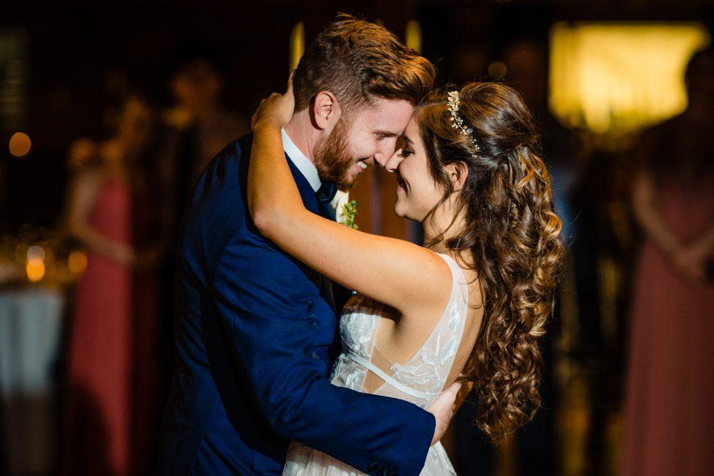 bride and groom dance at wedding reception