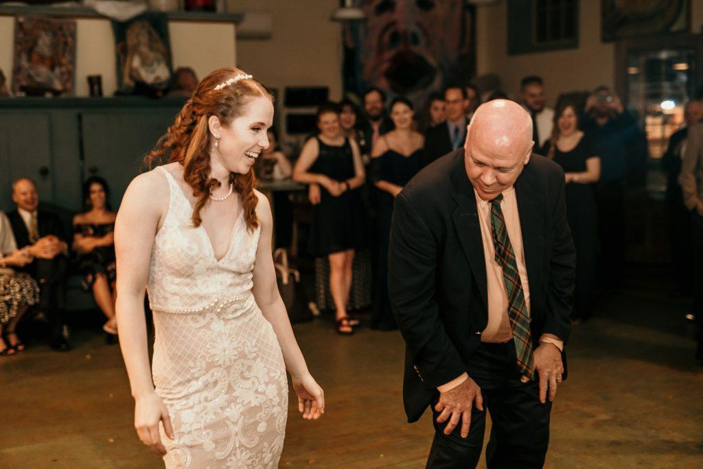 bride dances with father