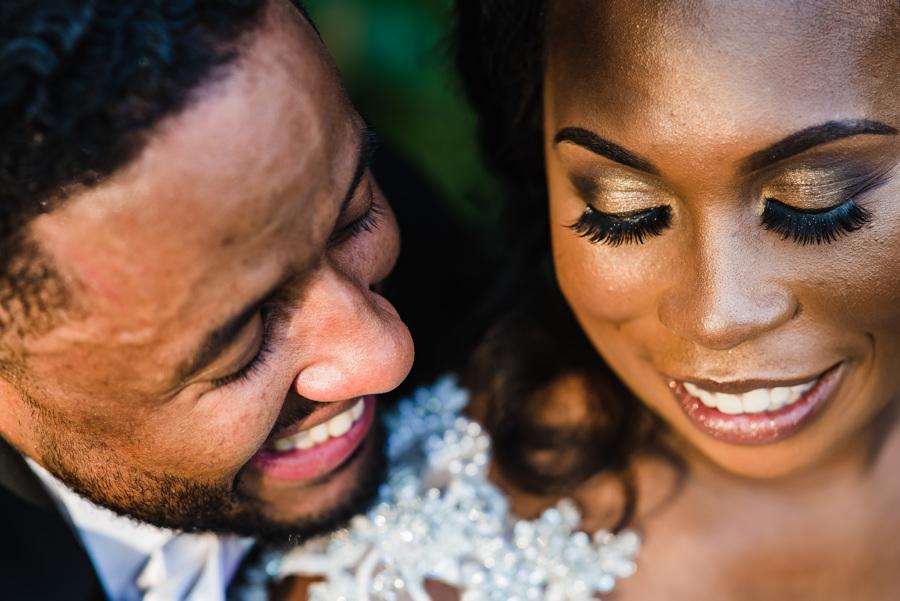smiling bride and groom close up portrait
